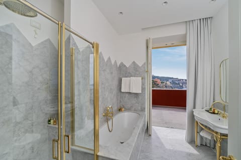 Junior Suite, Hot Tub, Sea View (Deluxe) | Bathroom | Free toiletries, hair dryer, bathrobes, slippers