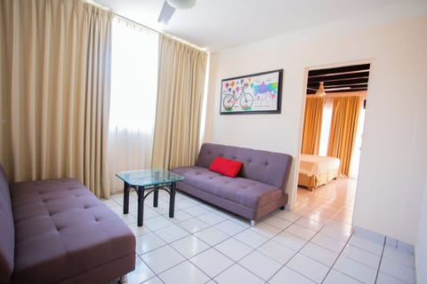 Grand Suite | Living area | 42-inch LED TV with cable channels, TV