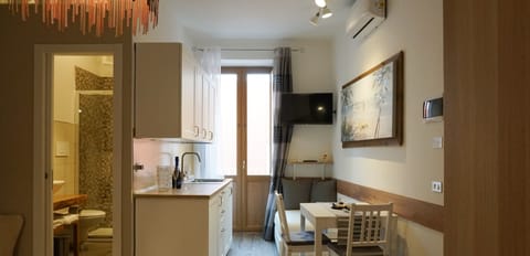 Premium Room | Living area | Flat-screen TV