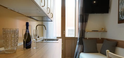 Premium Room | Living area | Flat-screen TV