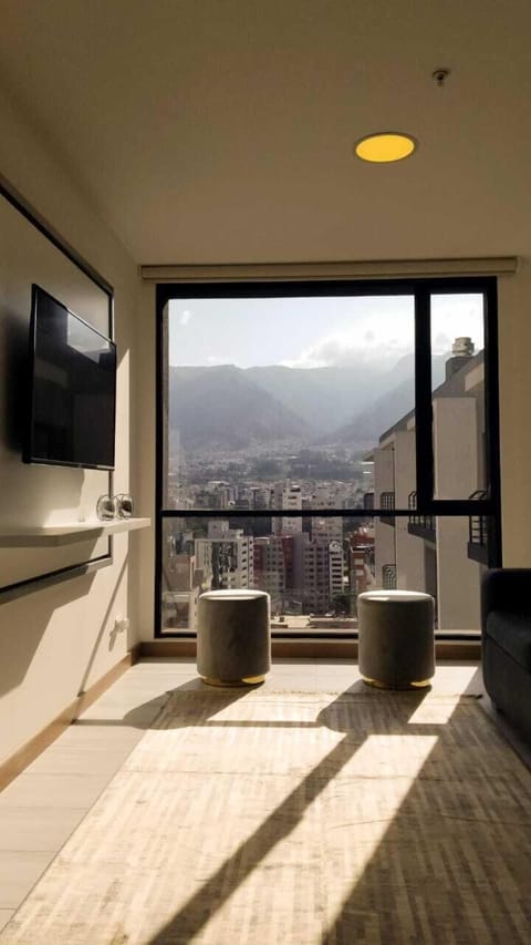 Comfort Apartment | Living area | 50-inch Smart TV with cable channels, TV, Netflix