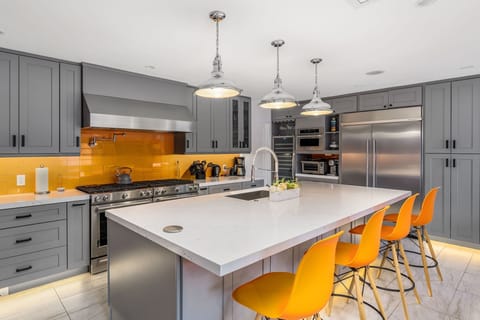 Top-of-the-line features a chef-worthy gas range and oversized fridge