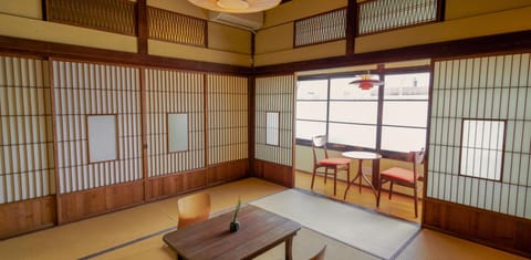 Japanese Style Room for 4 People with Shared Bathroom, Non Smoking | In-room safe, iron/ironing board (on request), WiFi (free), bed sheets