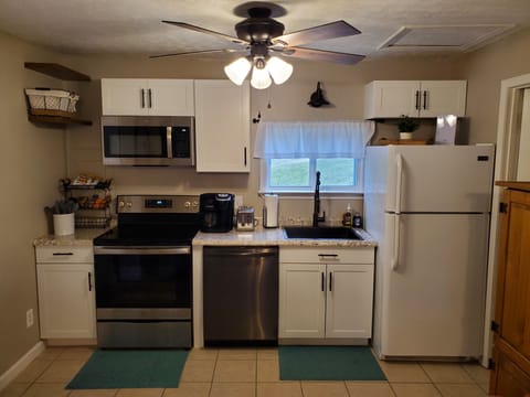 Well-stocked kitchen with appliances