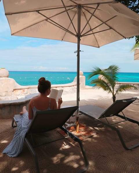 Private beach, white sand, sun loungers, beach umbrellas