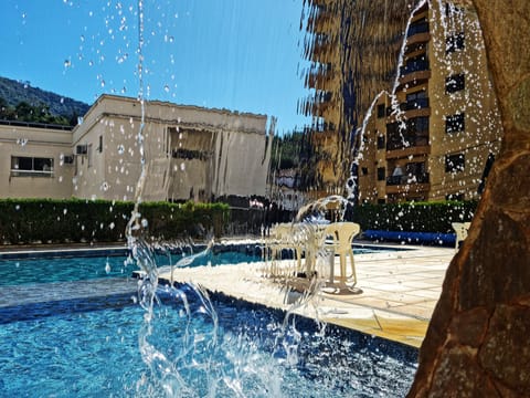2 outdoor pools, a waterfall pool, sun loungers