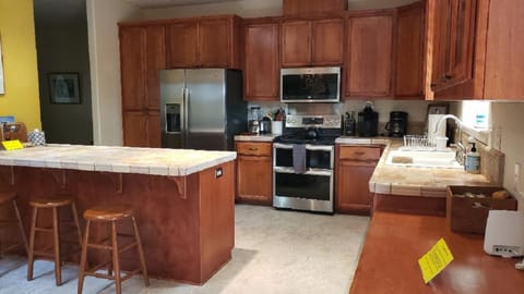 Large kitchen with plenty of storage.