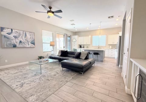 Leather sectional to watch TV in the open floor plan