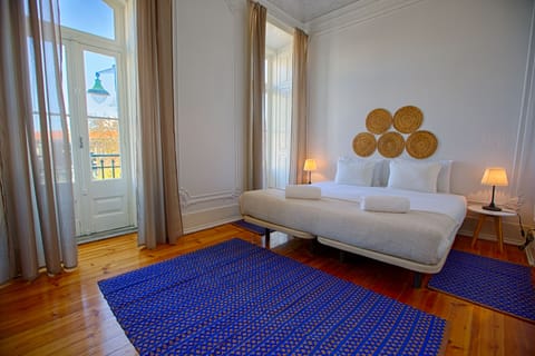 Deluxe Double or Twin Room, Shared Bathroom | Laptop workspace, blackout drapes, iron/ironing board, free WiFi