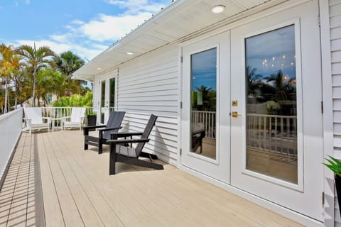 Spacious outdoor balcony with lounge seating