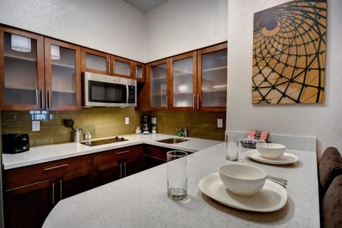 Desk, laptop workspace, blackout drapes, iron/ironing board