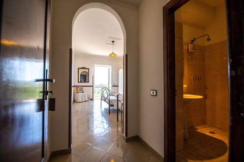 Classic Triple Room, Balcony, Mountain View | Room amenity