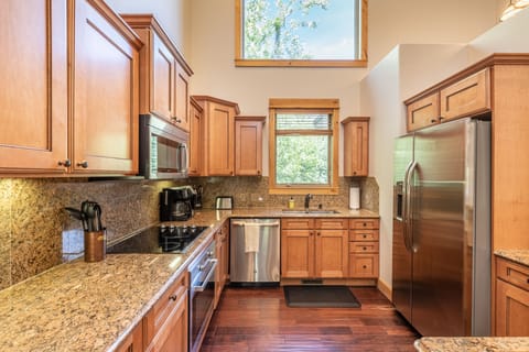 Full kitchen including refrigerator, stove, oven, Keurig, blender, toaster 