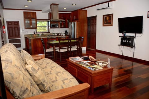 Deluxe Suite, 1 Bedroom (Namaste) | Living area | 40-inch Smart TV with cable channels, TV, DVD player