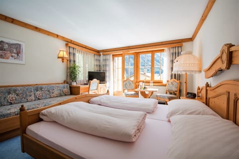 7 bedrooms, down comforters, memory foam beds, desk