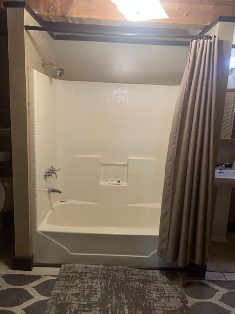 Unit A, King Suite | Bathroom | Shower, hair dryer, towels, soap