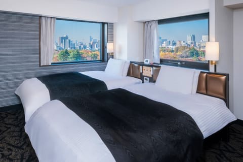 Twin room NonSmoking | Down comforters, desk, blackout drapes, iron/ironing board