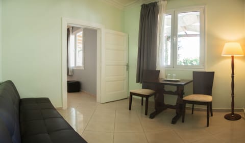 Triple Room | In-room safe, blackout drapes, iron/ironing board, free WiFi