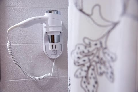 Double Room, Balcony (Genziana) | Bathroom amenities | Shower, free toiletries, hair dryer, bidet