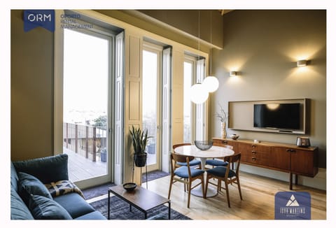Panoramic Apartment, 1 Bedroom, Terrace | Living area | Flat-screen TV, heated floors