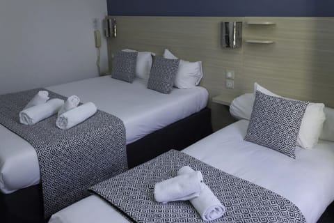 Desk, laptop workspace, blackout drapes, soundproofing