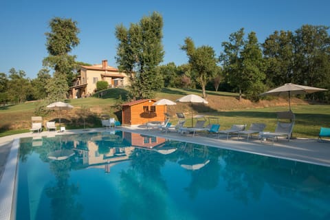 Outdoor pool, open 9:30 AM to 10:30 PM, pool umbrellas, sun loungers