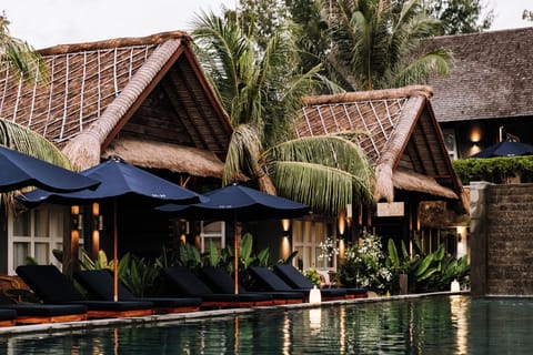 Outdoor pool, pool umbrellas, sun loungers