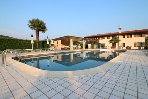 Seasonal outdoor pool, pool umbrellas, sun loungers