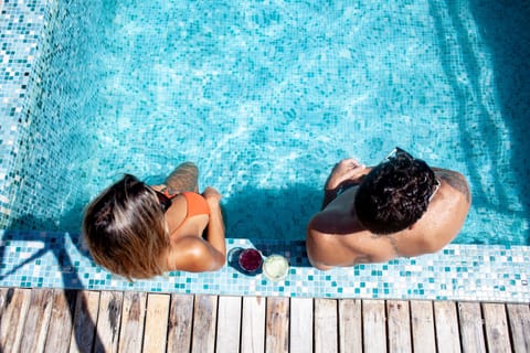Outdoor pool, pool umbrellas, sun loungers