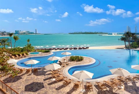 2 outdoor pools, an infinity pool, open 8:30 AM to 8:00 PM, free cabanas