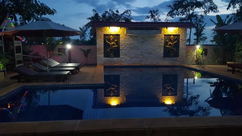 Outdoor pool, pool umbrellas, sun loungers