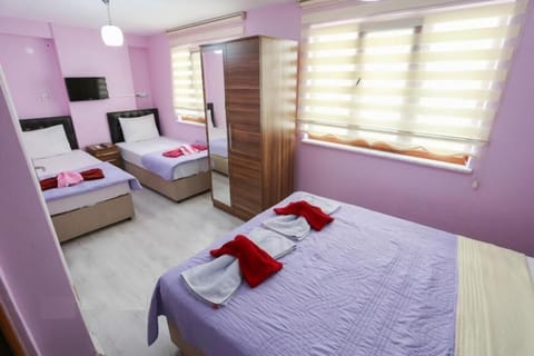 Economy Quadruple Room | Premium bedding, soundproofing, free WiFi, bed sheets