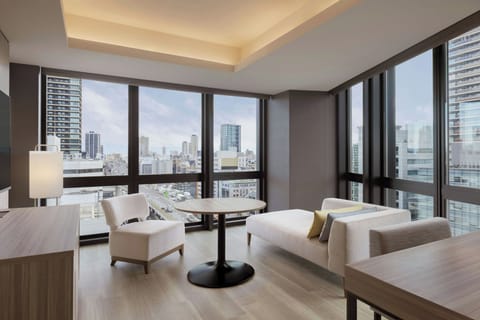 Suite, 1 King Bed | Living room | LCD TV