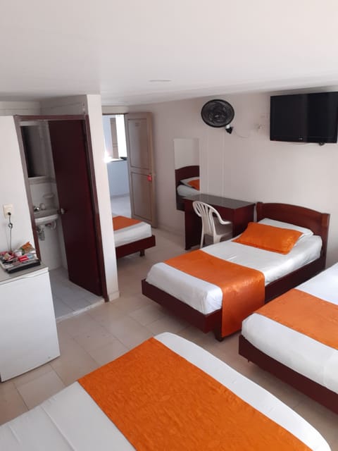Quadruple Room | Hypo-allergenic bedding available, minibar, desk, WiFi (free)