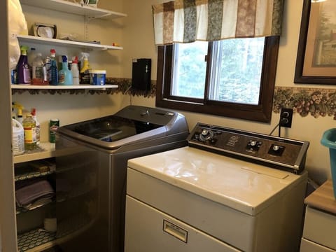 Laundry Room: Enjoy the convenience of in-home laundry with ample storage and natural light!