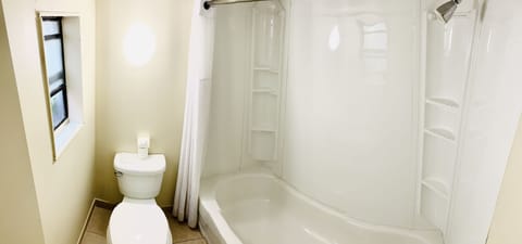 Double Room, 2 Double Beds, Microwave, Ground Floor | Bathroom | Combined shower/tub, free toiletries, hair dryer, bidet