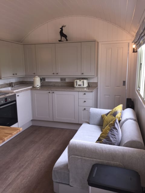 Open plan lounge/kitchen with Granite work tops.