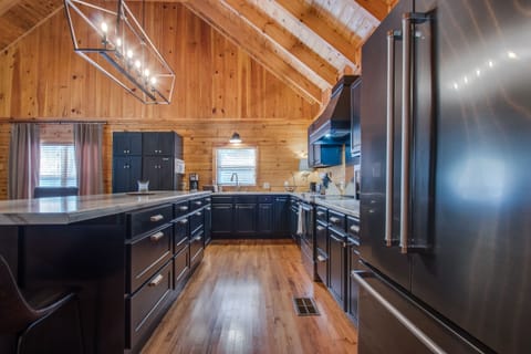 freshly remodeled kitchen, all new appliances,fully stocked, island seating for8