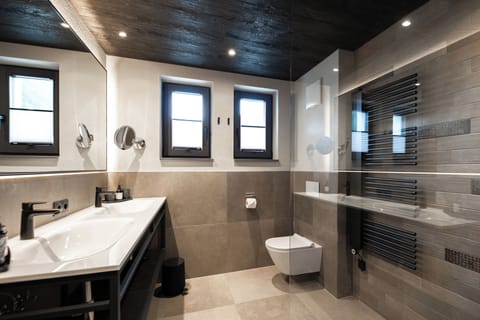 Shower, rainfall showerhead, designer toiletries, hair dryer