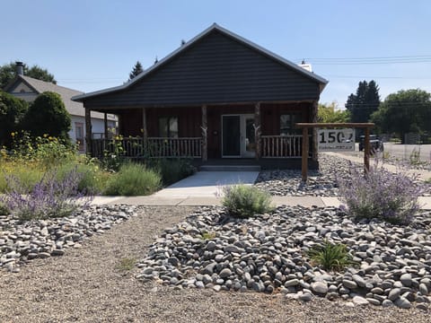 Wildflowers in front. 