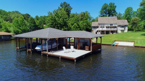 Steps to Lake, Boathouse with Lounge/Bar. Amazing views and privacy!