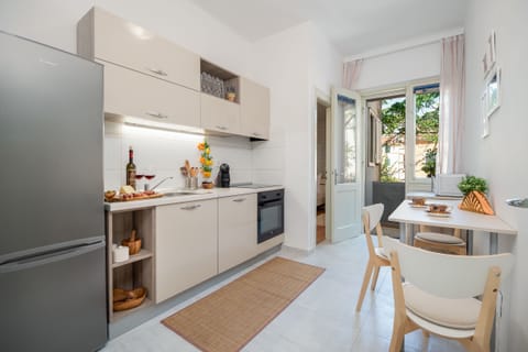 Classic Apartment, Balcony | Private kitchen | Full-size fridge, microwave, oven, stovetop