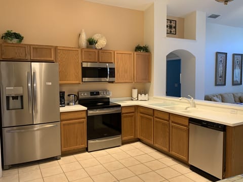 Kitchen with new stainless steel appliances 