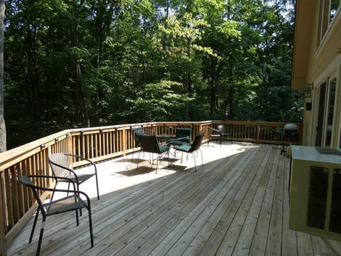 Beautiful deck with gas grill.
