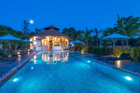 Outdoor pool, pool umbrellas, sun loungers