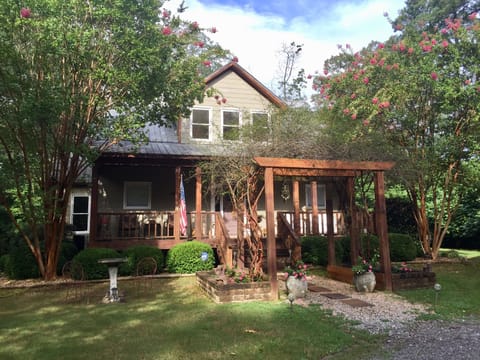 WATER FRONT LAKE PROPERTY. Over 150 feet.  Complete relaxation on 3 porches.