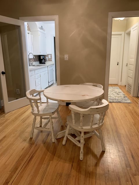Dining area with 6 chairs and a high chair 