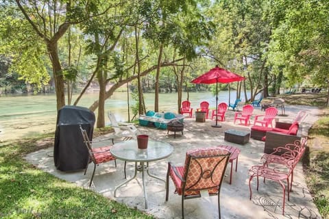  Concrete pad at the waters edge with ample seating, propane grill, and direct river access.
Paddle Boat was swept away in flood, no longer available. 