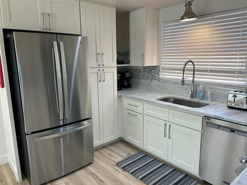 Fully equipped kitchen with large frig w/drip and Keurig coffee station