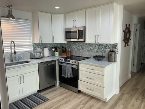 New dishwasher & 5 burner glass-top stove/oven and microwave